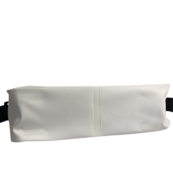 Overhead shot of a compact white waterproof mail handbag, emphasizing its slim profile and secure closure, suitable for keeping items dry while on the move.