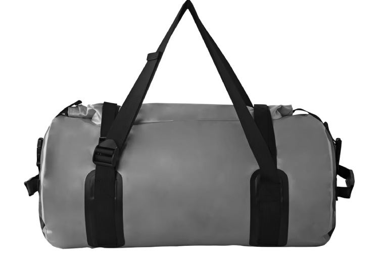 The image depicts a gray waterproof duffel bag with black straps. It has a simple design with two main compartments and a secure closure system.