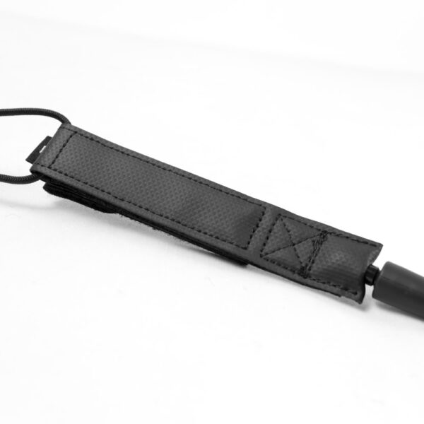 Rail saver of surfboard leash featuring laser-cut microfiber material