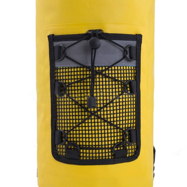Close - up of a yellow waterproof dry bag’s front mesh pocket with bungee cords, showing storage design details
