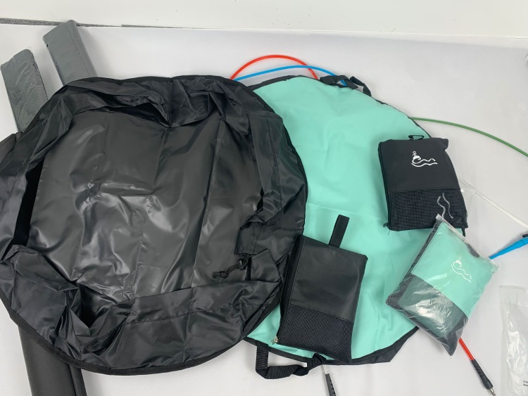 Black and mint green 600D surf changing mat and accessories display