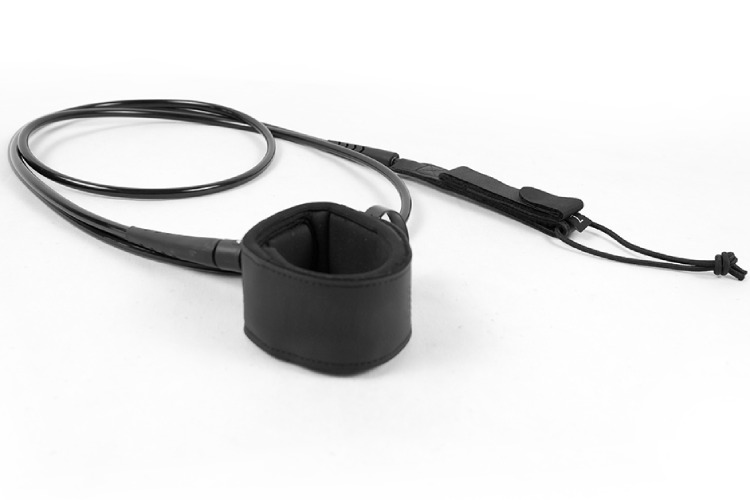 Premium surf leash with cuff open, showing rail saver and cord details