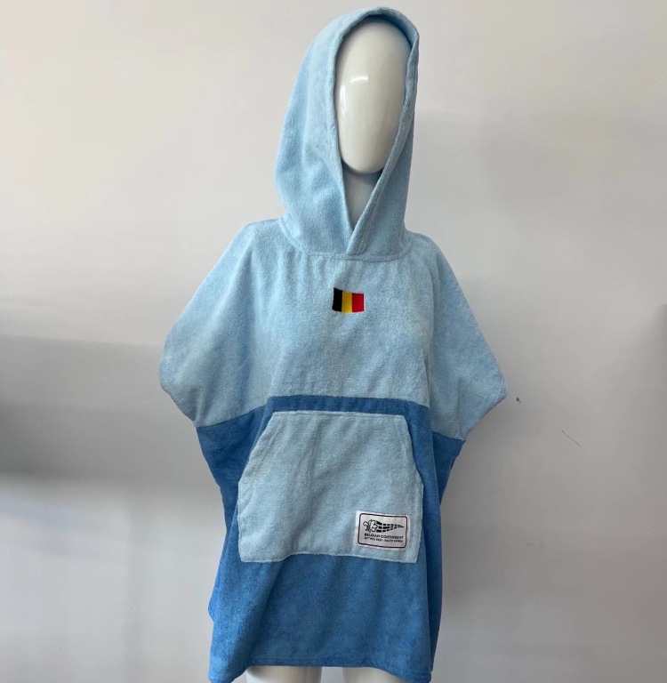 Front view of kids hooded surf poncho in light blue and royal blue with Belgian flag embroidery