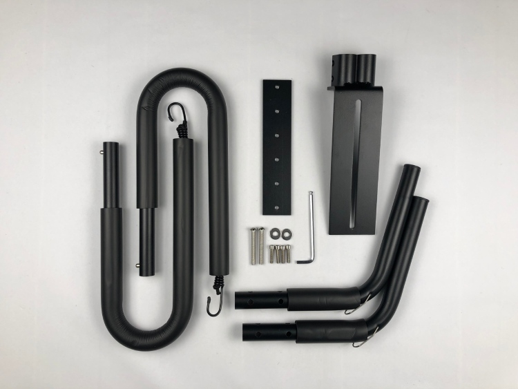 Unassembled moped surfboard rack kit with padded arms, brackets, bolts, and mounting tools
