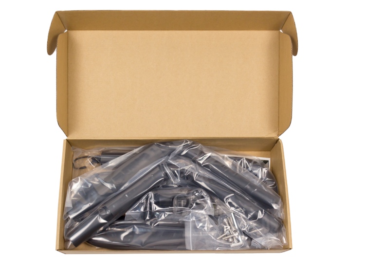 Surfboard bike rack parts neatly packed in a cardboard box