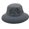 The dark green surf hat has water droplets on its surface, suggesting it is suitable for wet conditions.