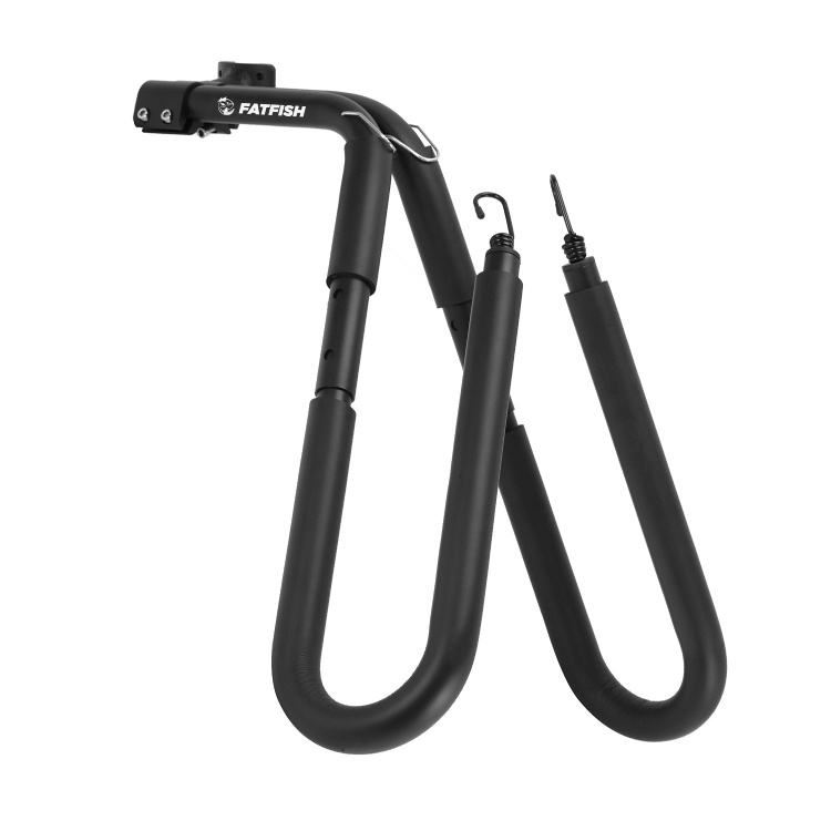 The image shows a surfboard bike rack by FATFISH. The rack is primarily black with the brand name "FATFISH" visible on the top part. It features two curved arms with hooks at the end, designed to securely hold a surfboard on a bike. The rack appears to be made of durable materials, suitable for transporting surfboards.