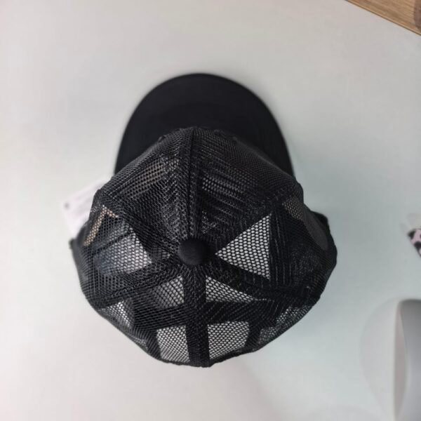 Back view of Surf Baseball Cap The image shows a black Surf Baseball Cap from a top - down perspective. The cap features a mesh design for ventilation, with a solid black brim and a button on top.