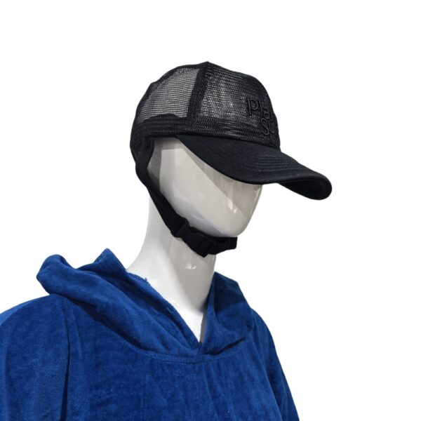 Black baseball Cap on a Mannequin The image shows the black Surf Baseball Cap worn by a mannequin. The mannequin is dressed in a blue hoodie, and the cap's adjustable strap is visible under the chin.