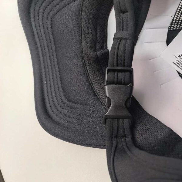Straps of Surf Baseball Cap This image shows the inside of the black Surf Baseball Cap. The interior features a black sweatband with stitched lines for comfort, and an adjustable strap with a plastic buckle for sizing.