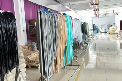 Shero Surf production line with colorful surf leashes in drying process